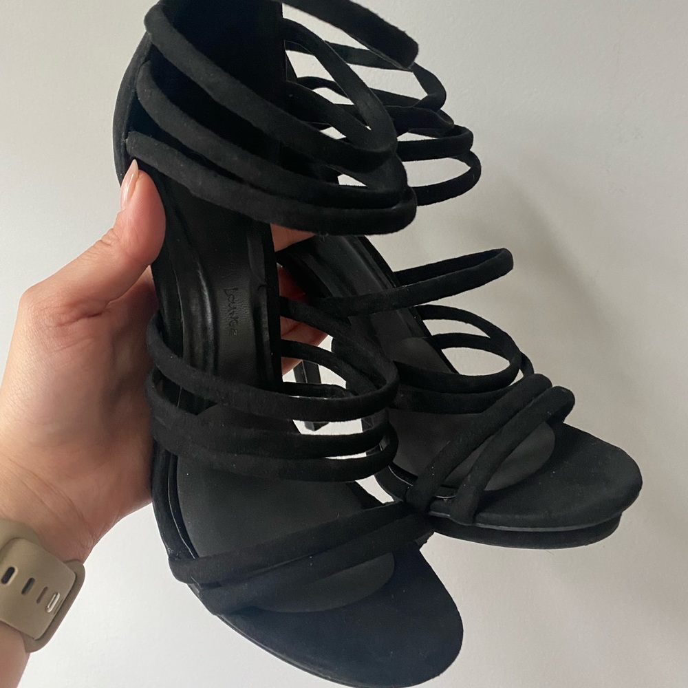 Scrappy black heels